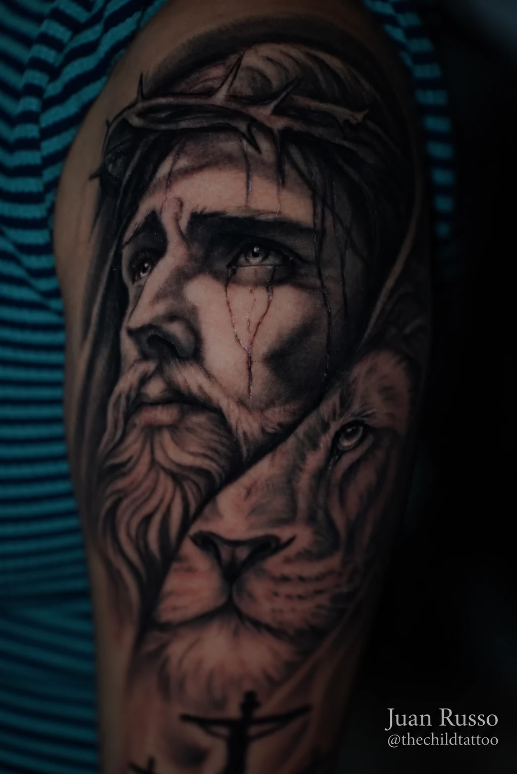 Christ and lion tattoo by Juan Russo in Cordova, Memphis.